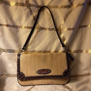 Rossetti clutch/wristlet canvas with vinyl trim.